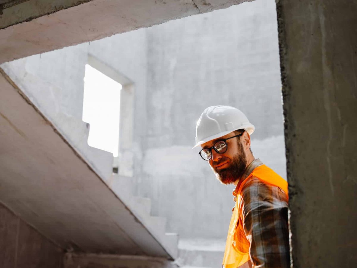 Young businessman construction standing on his workplace on the construction site Young businessman construction standing on his workplace on the construction site